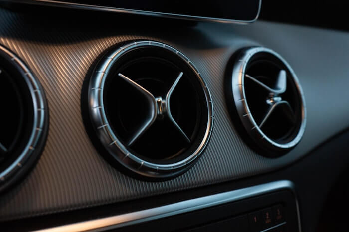 Car interior vents and cup holders